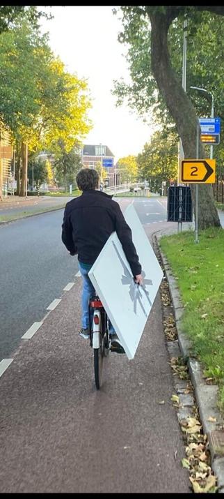 Taped a desktop top to my hand to get it from Ikea to my home.