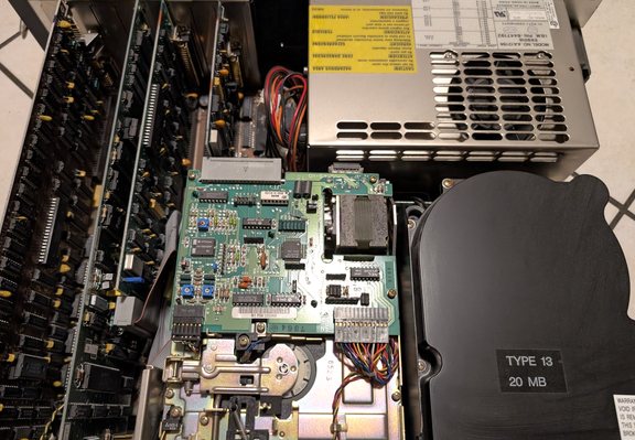 Interior of the IBM 5160, featuring the daughter boards, floppy drive, hard drive and powersupply