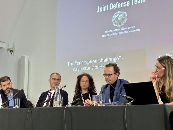 Panel of (male) moderator with two men and women expert speakers