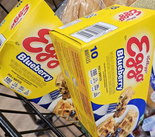 2 boxes of Eggo Waffles in my supermarket cart