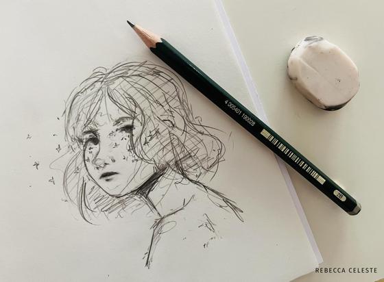 Pencil sketch of a woman with the pencil next to it