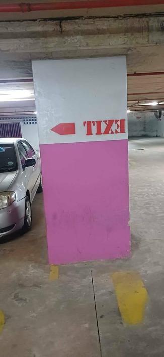 Exit indicator stenciled in backwards