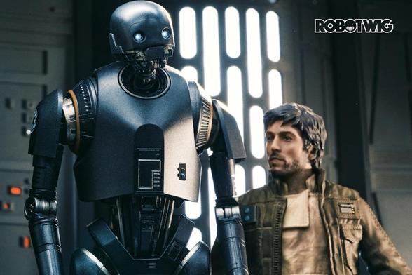 Cassian and K-2SO stand in a corridor on the Death Star