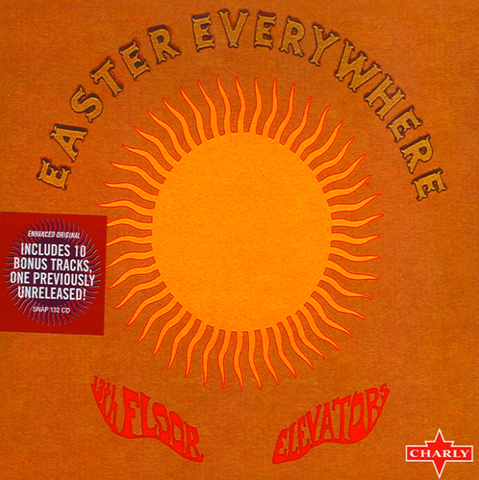 A yellow sun on an orange background.