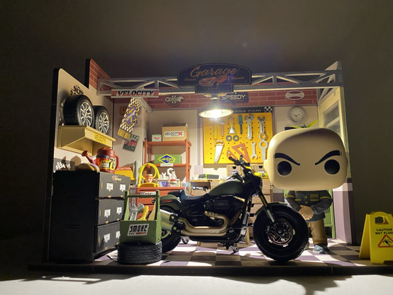 Cal, Harley Davidson, and Rolife Garage Workshop