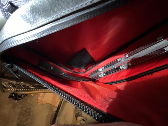Inside view of Salsa Frame pack with custom mounting bars and magnetic battery mount