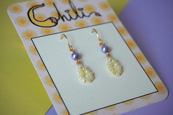 Earrings with yellow pearls