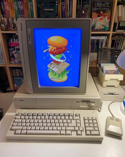 Amiga 1000 displaying the "Four-Byte Burger" from the Amiga's early PR media