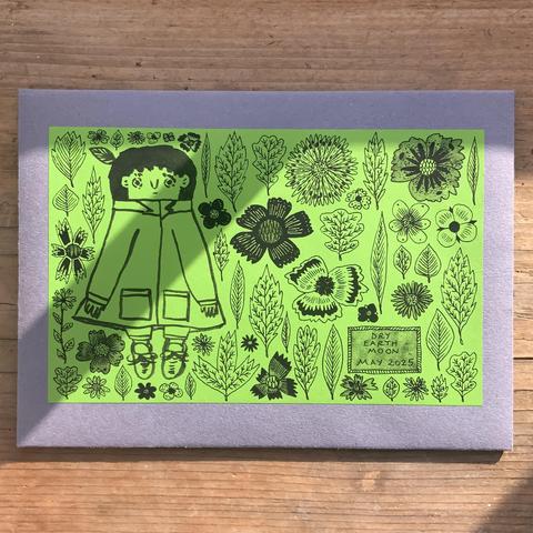 An illustrated envelope with detective Tso looking slightly forlorn, standing amongst a sea of leaves and flowers.