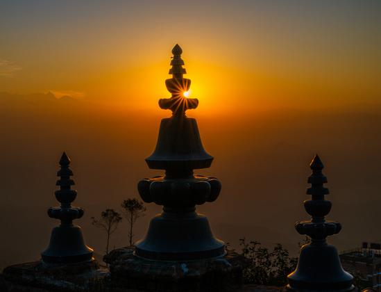 Sunrise sunstar on silhouette of rooftop stupas at the Fort Resort, Nagarkot, Nepal
Captured by Komeil Karimi