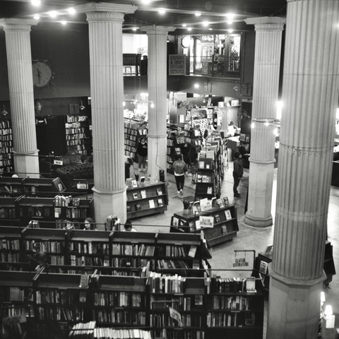 A black and white film photo. An interior shot illustrating the scale and uniqueness of The Last Bookstore in downtown Los Angeles, California. Sunday, May 18, 2025.