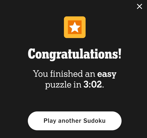 Screenshot of a Sudoku game completion screen with a star graphic and a congratulatory message indicating completion of an easy puzzle in 3 minutes and 2 seconds.