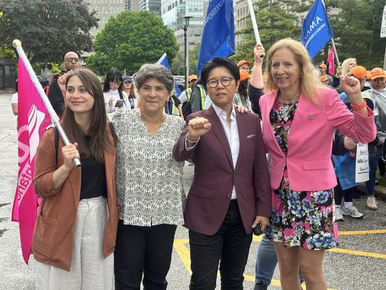 New Democrats at rally in solidarity