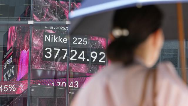 World shares are mixed ahead of Friday's US jobs report