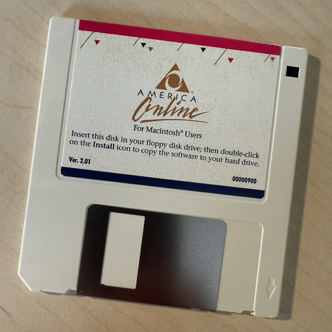 An old 3.5” installation diskette for AOL for Mac ver 2.0