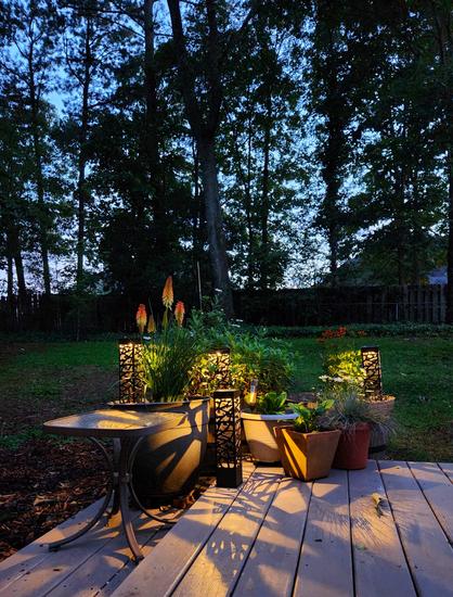Corner of my deck with lights and flowers