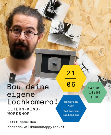 Me with a black and silver pinhole camera in my hand. In the background photos on a washing line. Text on the picture: Build your own pinhole camera! Parent-child workshop 21.06. 14:30-18:00 Happylab Vienna Participation free of charge! Register now: Andreas.wildmann@happylab.at