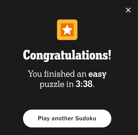 Screenshot displaying a congratulations message for completing an easy Sudoku puzzle in 3 minutes and 38 seconds. A gold star icon is at the top of the message, and a button reads "Play another Sudoku." An "X" is displayed in the upper right of the screen.