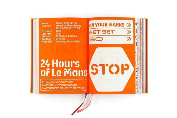 Open book pages featuring bright orange design with details about the 24 Hours of Le Mans, including venue, history and interesting facts.