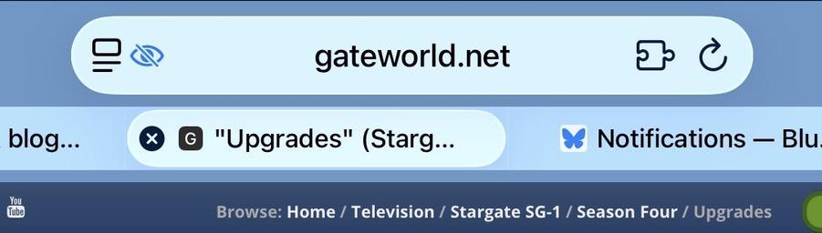 Tabs in Safari, where the webpage beneath is blue and the selected tab is more easily discerned
