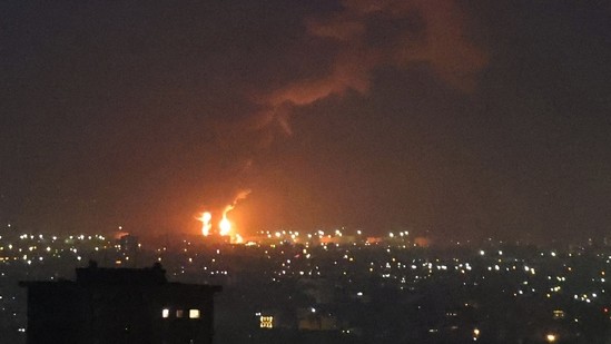 Iran Israel war news live updates: Flames from a fire at the Tehran oil refinery, located south of the capital, are seen burning in the distance on June 15, 2025.