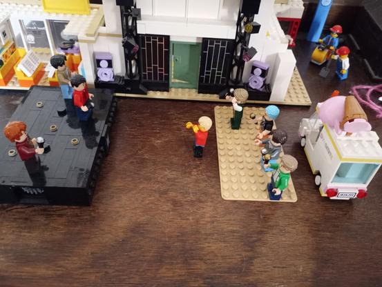 BTS Lego. Jin, Jhope & Jungkook on stage. I'm watching. Behind me, Jimin, Suga, RM, V ( who is dancing)
