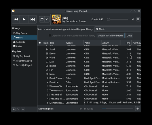 RhythmBox attempting to import songs. It scans a folder and list the songs it finds, providing a button to import the whole lot into the database.
