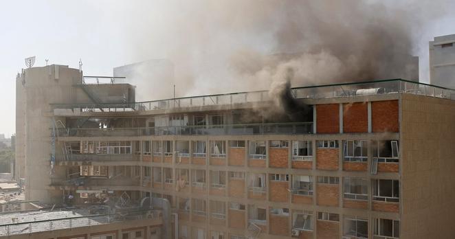 Israel vows to hold Iran's leader accountable for "war crimes" after Iranian missile slams into hospital