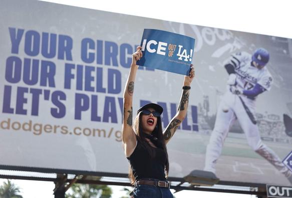 Protesters call on Dodgers to do more to support immigrants: ‘It’s devastating for me’