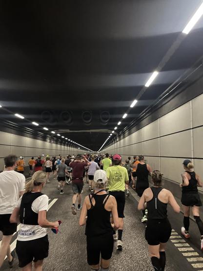 Lots of runners inside the Drogden Tunnel beneath the Øresund strait, heading from Denmark toward Sweden.