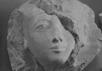 A distinct face is present in a rocky chunk of stone - actually it's an Egyptian statue that has been destroyed in ancient Egypt lifted from a Metropolitan Museum of Art picture featured today in a Gizmodo article.  Ha ha. Me make joke.