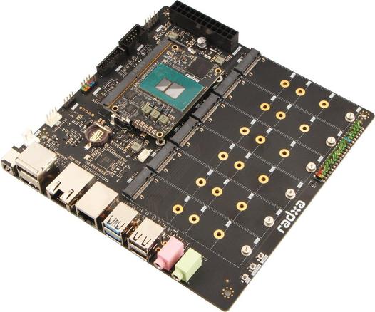 A MiniITX carrier board with a system on module installed. It has six empty M.2 slots, and a raspberrypi pin out.