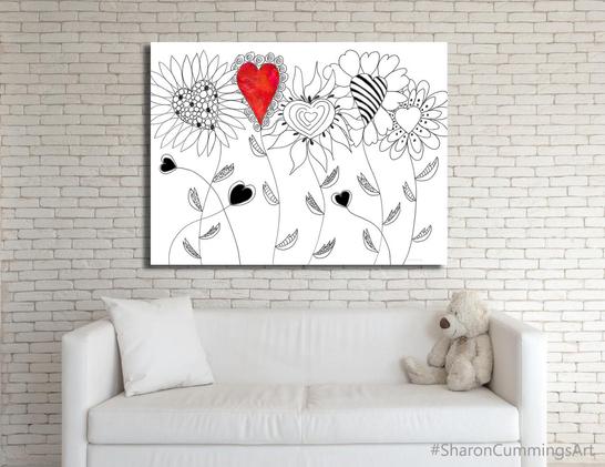Black and white flowers drawing with one red heart as the center of a flower in furniture setting by Sharon Cummings.