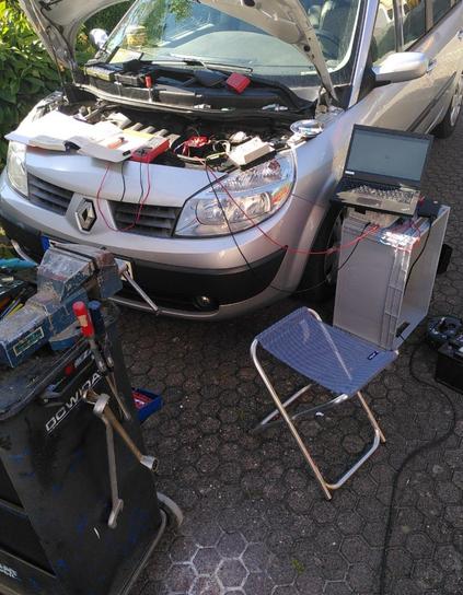 Car with partiall disassembled engine bay