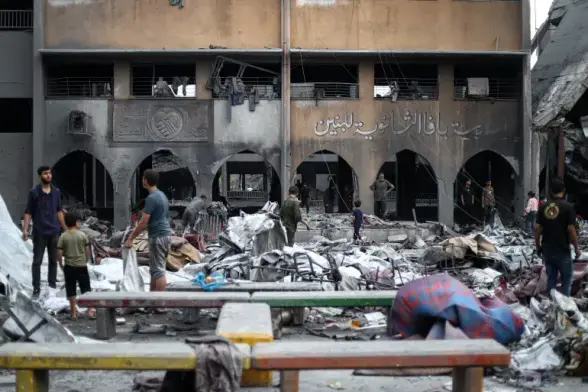 The school was destroyed in the attack along with tents sheltering displaced Palestinians [Khames Alrefi/Anadolu]