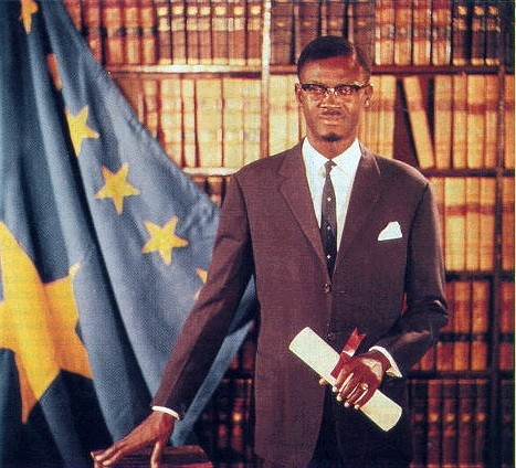 Official portrait of Lumumba as prime minister of the Republic of the Congo, 1960. He’s wearing glasses, a suit, and has a thin mustache and goatee. By unknown, Republic of the Congo (Léopoldville) government - http://www.finalcall.com/artman/publish/Perspectives_1/article_6904.shtml, Public Domain, https://commons.wikimedia.org/w/index.php?curid=57463710