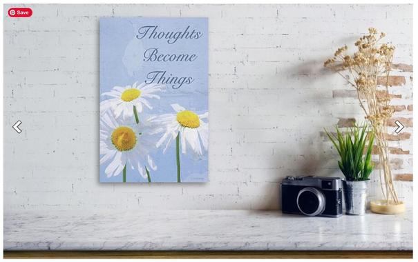 Three white daisies on blue with the words Thoughts Become Things by artist Sharon Cummings.