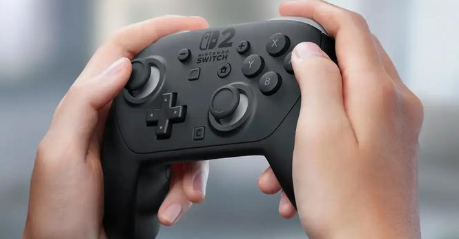 A close-up image of a pair of hands holding the Nintendo Switch 2 Pro Controller at a slight angle.