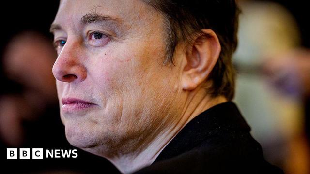 A close up of Tesla chief executive Elon Musk from his left side