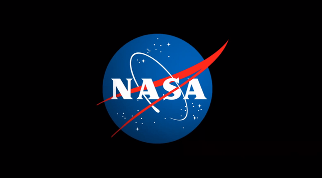 The letters NASA on a blue circle with red and white detail, all surrounded by a black background The letters NASA on a blue circle with red and white detail, all surrounded by a black background