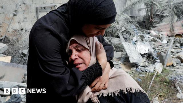 Naima, the grieving mother of Hala Zaarab, a Palestinian newlywed killed in an Israeli air strike, is comforted as she cries, in Khan Younis, southern Gaza, 3 May 2025