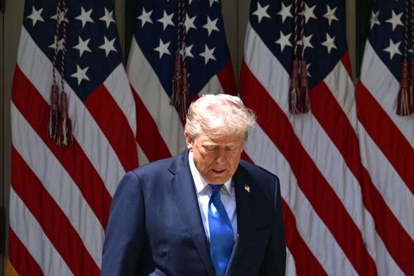 President Donald Trump arrives to speak at a National Day of Prayer event in the Rose Garden of the White House in Washington, D.C., on May 1, 2025.