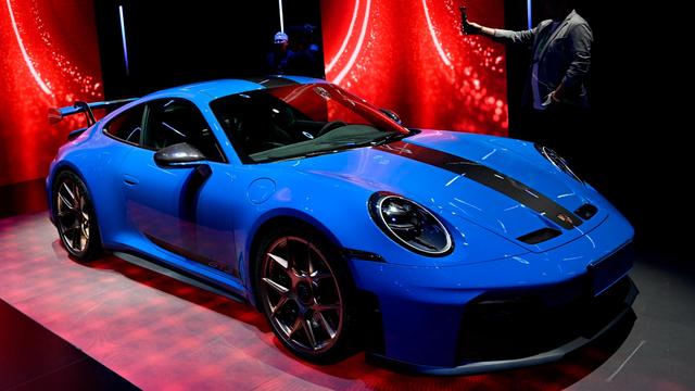 A blue Porsche | © Wang Zhao/AFP via Getty Images