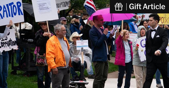 Protesters chanted “shame, shame, shame,” as guests arrived for the dinner.