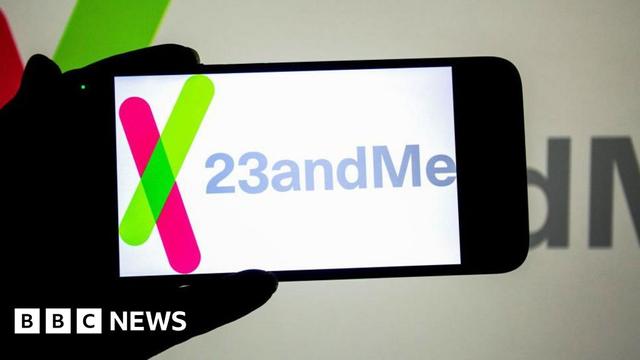 23andMe logo displayed on a smartphone screen