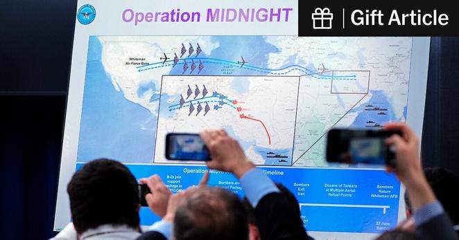Reporters photographing a display for “Midnight Hammer,” the name of the American operation to bomb Iran’s nuclear sites, during a news conference on Sunday.