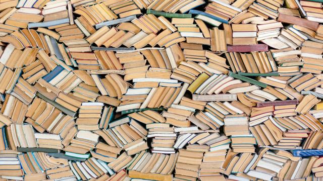 Hundreds of books in chaotic order