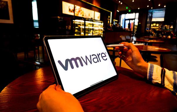 In this photo illustration, the Vmware logo is displayed on the screen of an iPad.