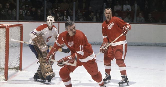 Alex Delvecchio, center, in a Detroit Red Wings game against the Montreal Canadiens in Montreal in the 1970s. At right was his teammate and fellow Hall of Famer Gordie Howe. 