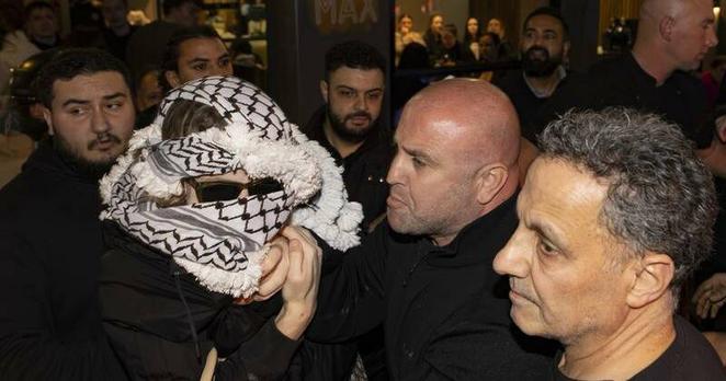 Three people were charged after a group of protesters converged on an Israeli-owned restaurant. Photo: Josh Stanyer/AAP PHOTOS